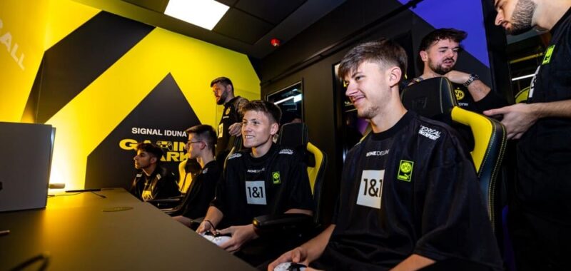 BVB eFootball team competing in event at esports cafe in central Dortmund.