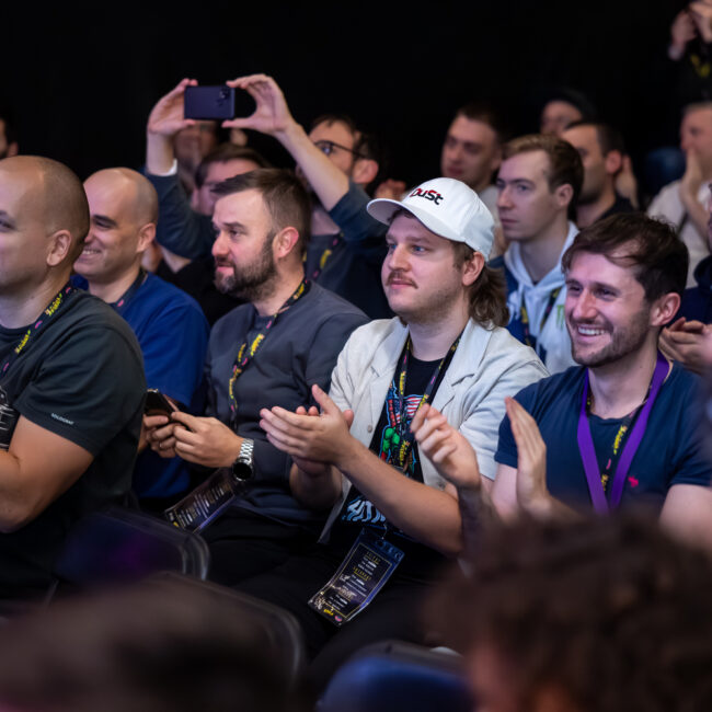 Crowd applauding at gaming event in Dortmund.