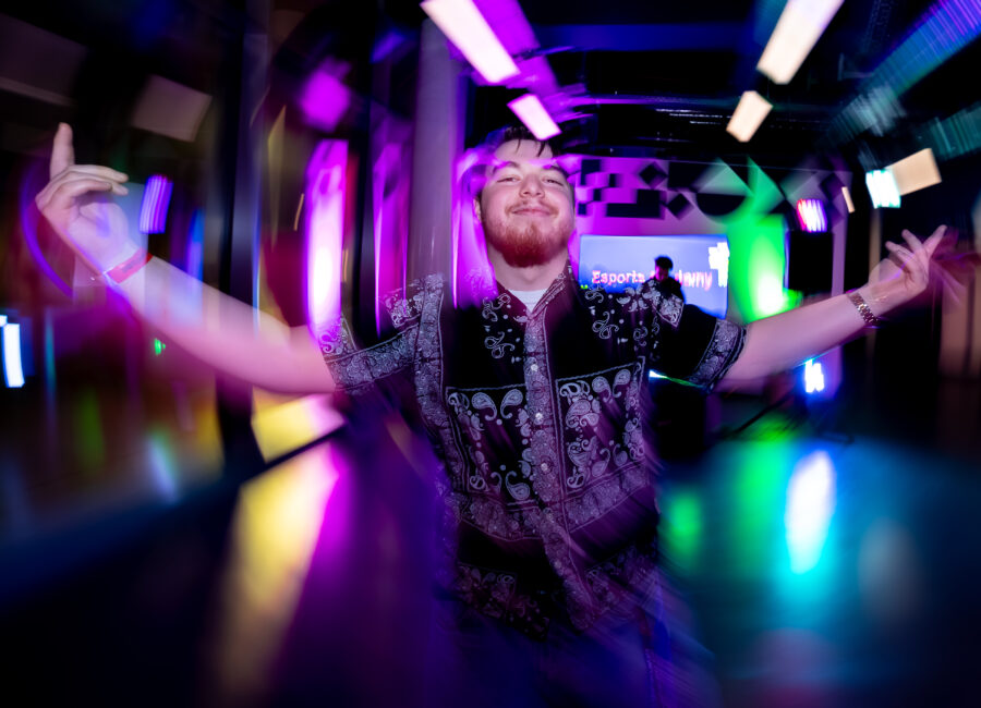 Man dancing on dance floor at Basestack Café & Bar in Dortmund