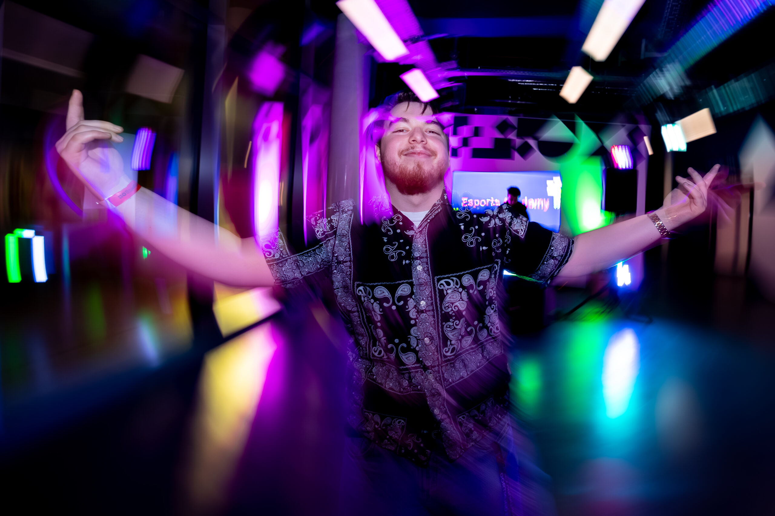 Man dancing on dance floor at Basestack Café & Bar in Dortmund