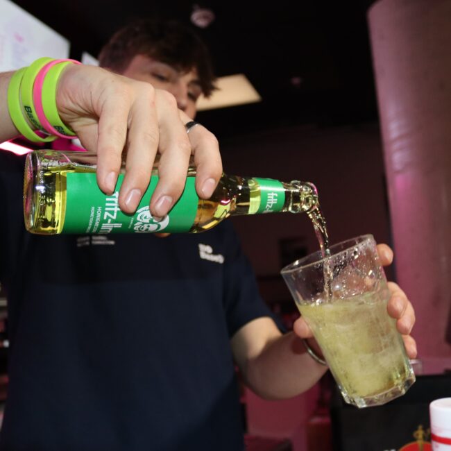 Pouring a drink in BaseStack bar.