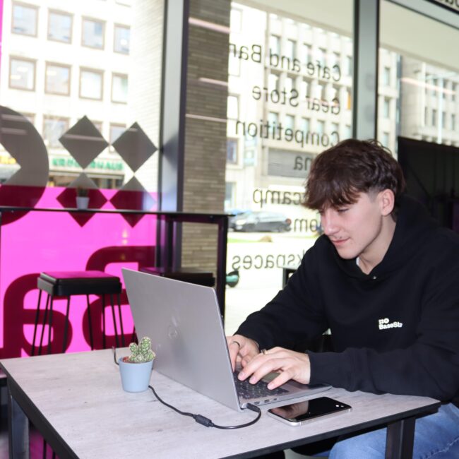 Man on laptop using Hot Desk and coworking In Dortmund, Germany