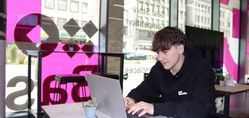 Man on laptop using Hot Desk and coworking In Dortmund, Germany