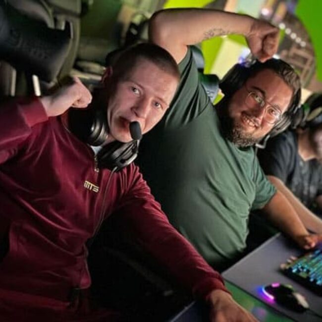 Another set of Basestack gamers happily posing for the camera while playing.