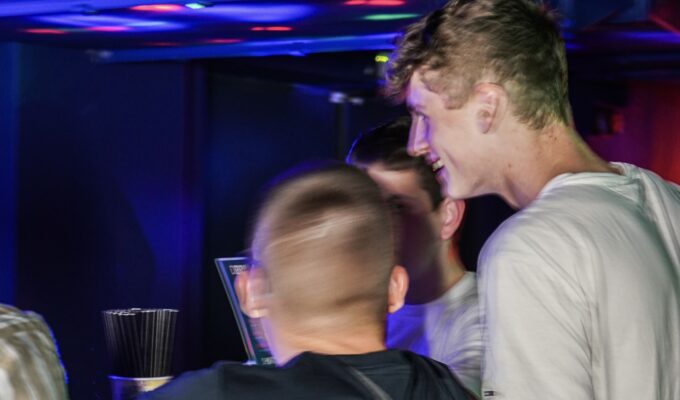 Group of boys partying at a bar in Łódź