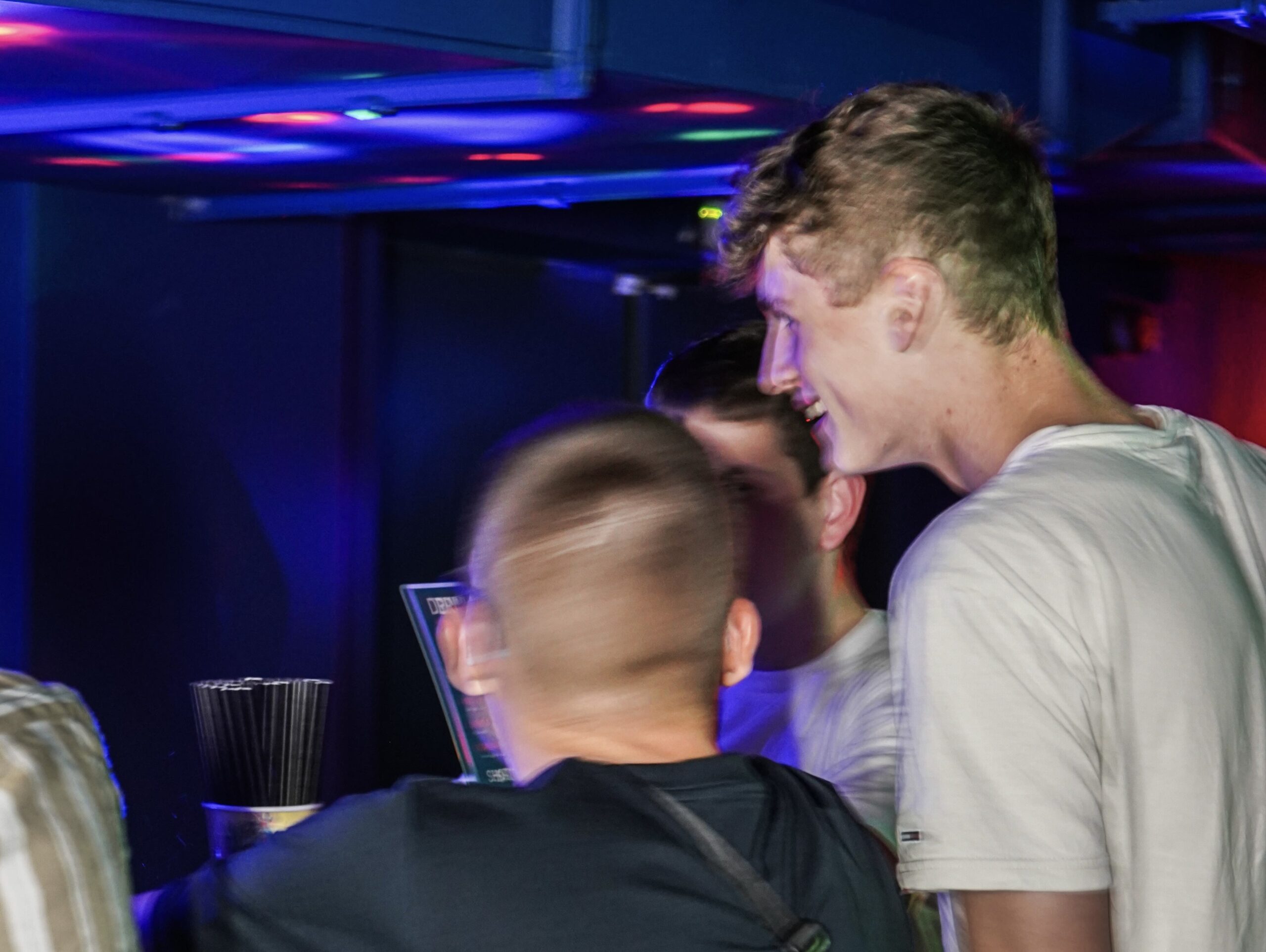 Group of boys partying at a bar in Łódź